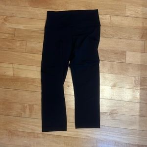 Lululemon black capris, size 8, luon, new without tags